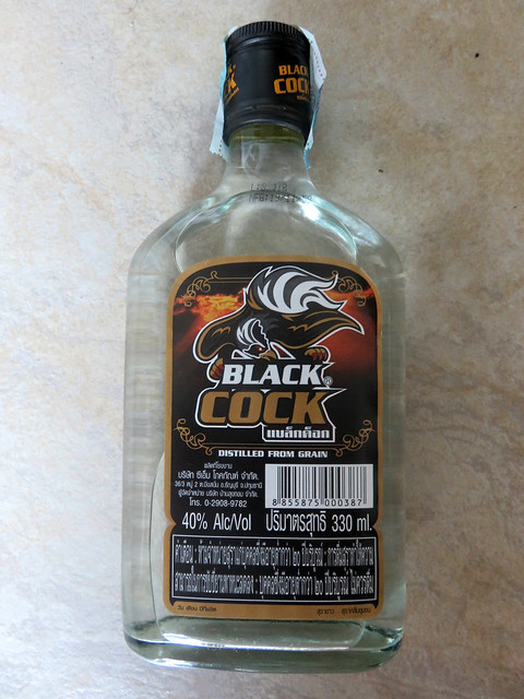 aline ziade add black cock vodka photo