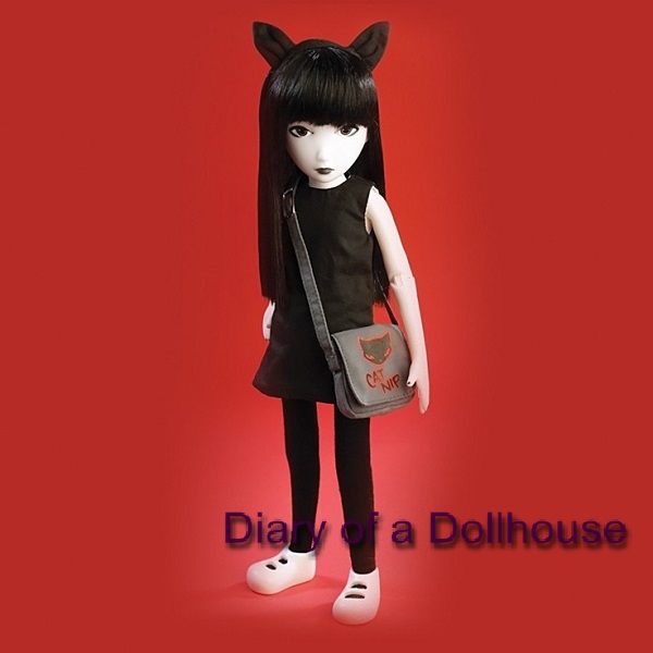 donna machado add peculiar doll image