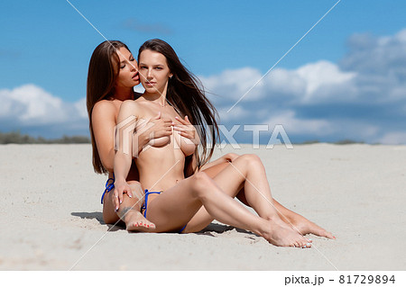 daniel mathews add bare breasts on the beach image