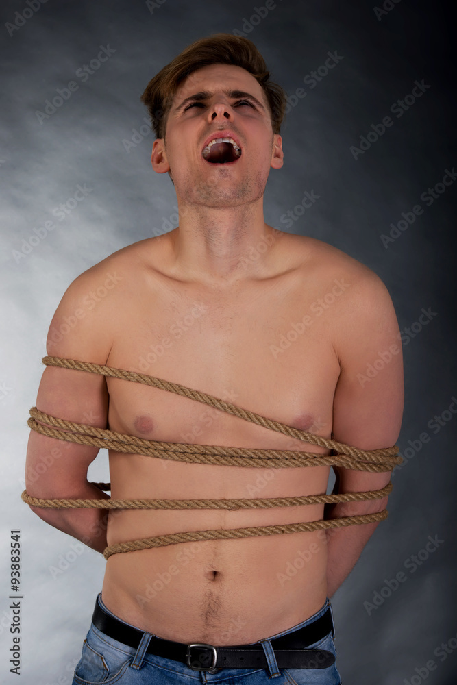 ashraf dahab add men tied up by men image